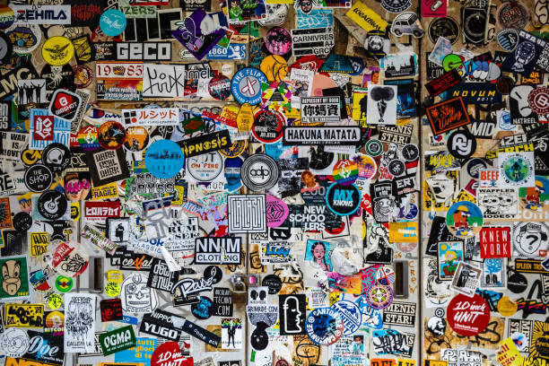 Sticker Background Tokyo, Japan - August 8, 2019: Sticker on the road stuck on the wall in Shinjuku ward, Tokyo emo stock pictures, royalty-free photos & images