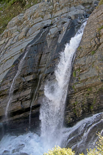 istock Rabi River flowing with speed with mountain rocks in the background 1173353075