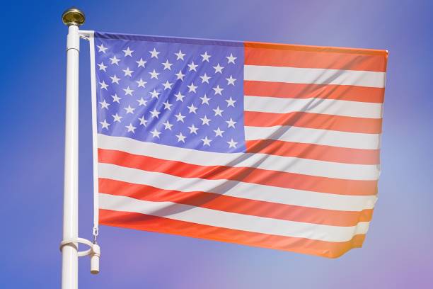 istock American flag on the blue sky 1173353440