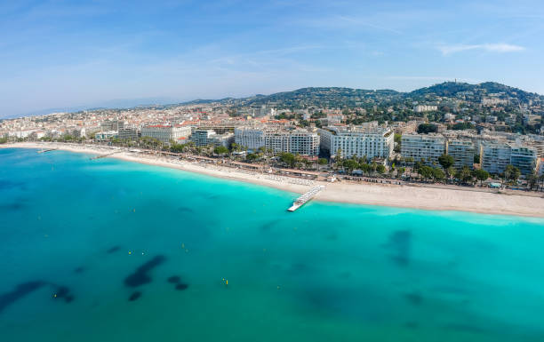 panorama of cannes, cote d'azur, france, south europe. nice city and luxury resort of french riviera. famous tourist destination with nice beach and promenade de la croisette on mediterranean sea - capital letter luxury blue image imagens e fotografias de stock