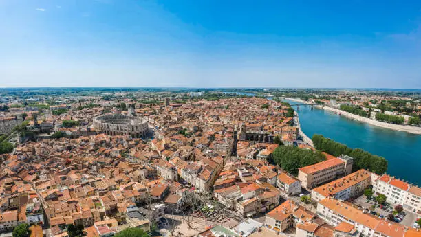 Photo of Panorama of ancient town Arles in Provence and Cote d'Azur, France, South Europe. Famous tourist destination with old Roman Artena