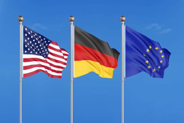 istock Three colored silky flags in the wind: USA (United States of America), EU (European Union) and Germany. 3D illustration. 1173362199