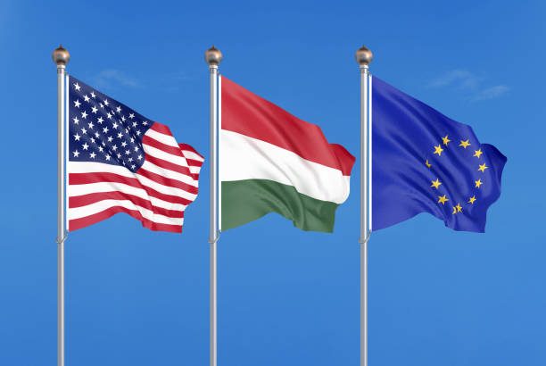 istock Three colored silky flags in the wind: USA (United States of America), EU (European Union) and Hungary. 3D illustration. 1173362225