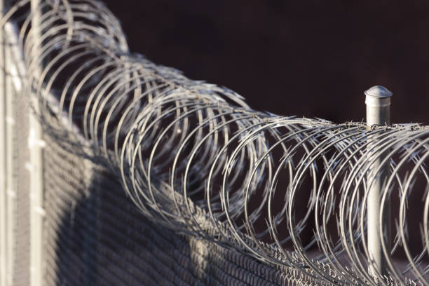Razor Wire Fence Border Homeland Security stock photo