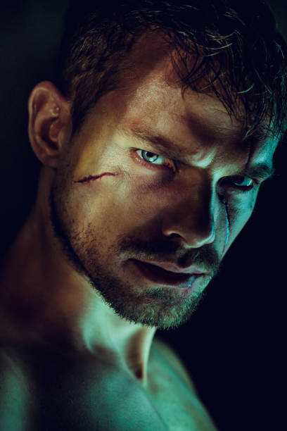 Man with scar on face. Halloween portrait.
