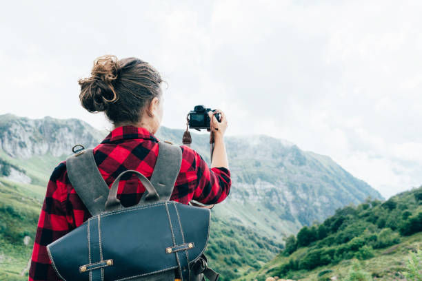 istock photographer in the mountains 1173367175