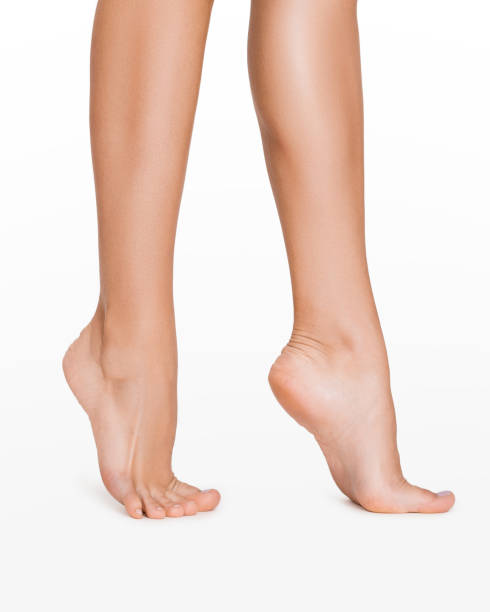 istock Perfect smooth legs. Woman stepping, on white 1173368238