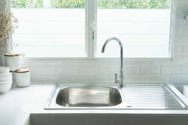 istock a kitchen sink near the window. 1173368604