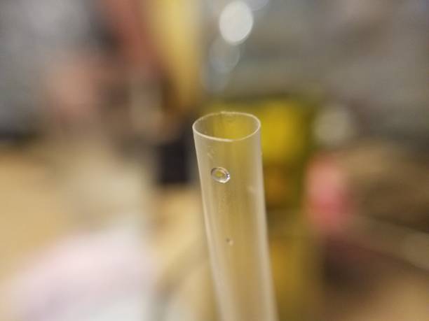 close up of a plastic straw and blurry background