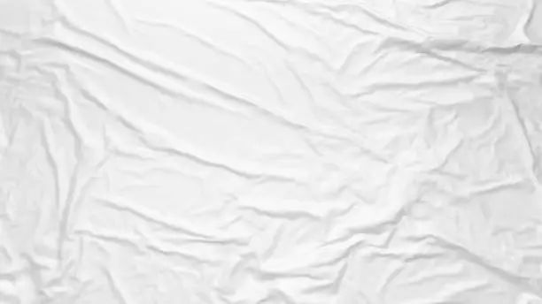 Photo of White wrinkled fabric texture. Paste poster template. Glued paper or fabric mockup.