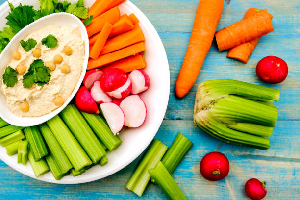istock Mediterranean Vegetarian Hummus Dip With Fresh Vegetables 1173371511