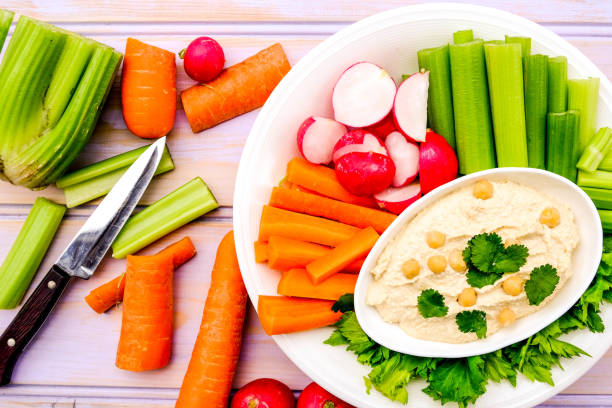 istock Mediterranean Vegetarian Hummus Dip With Fresh Vegetables 1173371545