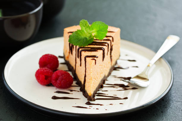 istock Pumpkin cheesecake with raspberries. Selective focus. 1173373374
