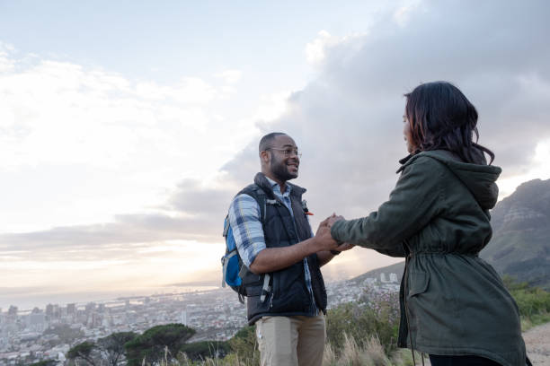 istock Smiling couple holding hands on Table Mountain 1173375731