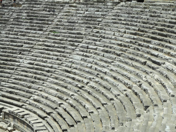 istock Ancient amphitheater in Myra, Turkey - archeology background 1173375929