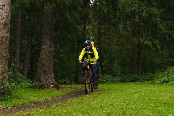 istock equipped bicycle hiker on a trail in the forest 1173379370