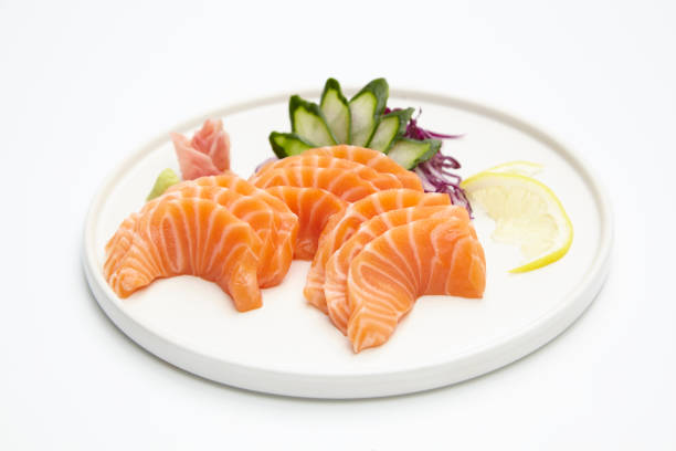 istock salmon sashimi isolated on white background 1173380161