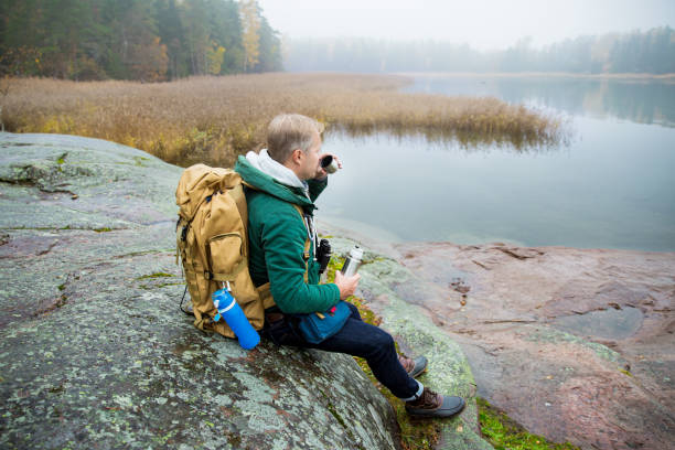 istock Mature man exploring Finland in the fall 1173380408