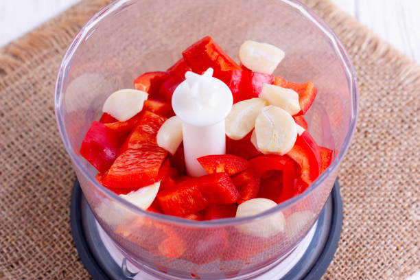 istock Tomatoes, red peppers and garlic in a blender 1173380451