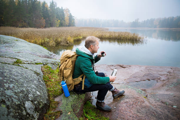 istock Mature man exploring Finland in the fall 1173381213