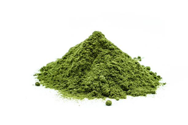 istock green barley powder isolated on white background 1173382538