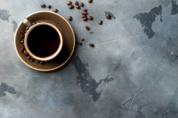 istock a Cup of coffee on the gray stone table with copy space for your text. 1173383561