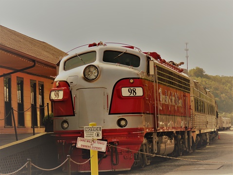 Branson, Missouri, USA—September 7, 2019: Branson Scenic Railway trains take tourists an hour and a half into the Ozark Mountains. Conductors tell the history of how the rails were laid through the mountains.