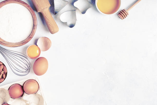 istock Ingredients for baking  - flour, wooden spoon, rolling pin, eggs. 1173394928