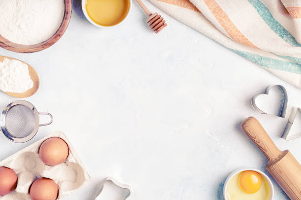 istock Ingredients for baking  - flour, wooden spoon, rolling pin, eggs. 1173395658