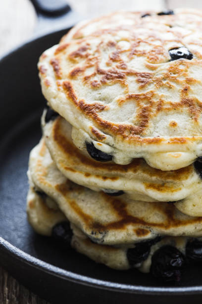 istock Blueberry pancakes in cast iron skillet 1173396437