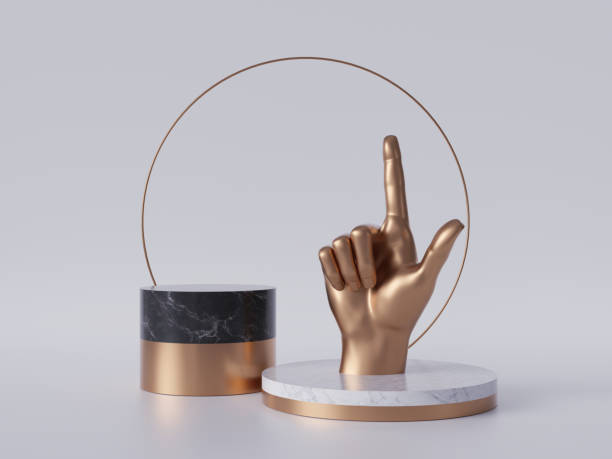istock 3d render, golden hand, finger pointing up, recommendation concept, black marble pedestal isolated on white background, gold round frame, blank cylinder podium, simple design, luxury minimal mockup 1173396990