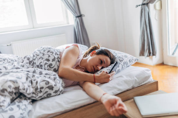 istock Woman checking the time on phone 1173400938