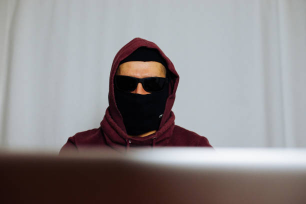 istock Portrait of a Hacker in Hoodie 1173403323
