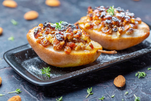 istock Pears with nuts, raisins and spices. 1173403477