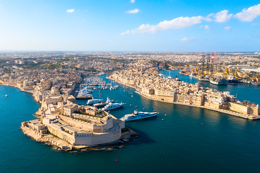 Aerial photo from a drone of Port Vauban, Antibes, Cote D'Azur, France. Including a row of very large yachts moored in this millionaire's paradise.