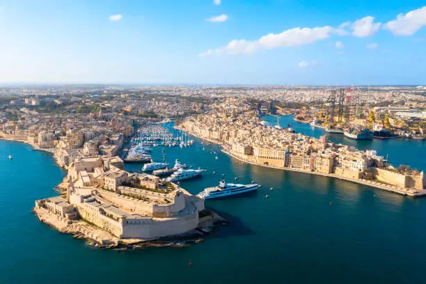 Malta. Birgu and Senglea cityscapes aerial drone view.Beautiful city bay. Maltese skyline.