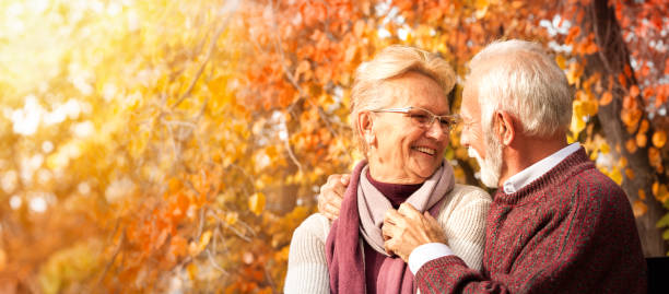 istock Tender senior couple embracing on bench 1173405740