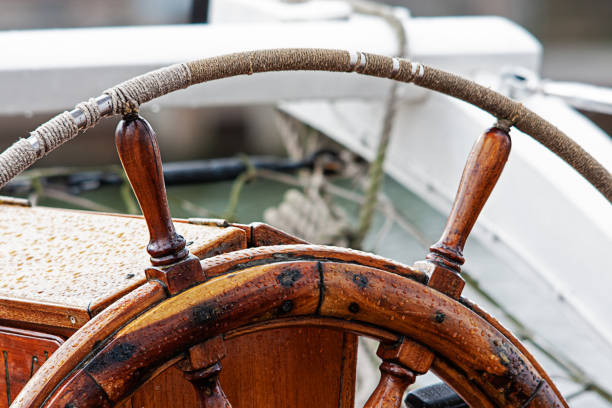 istock Steering wheel on sailing ship, vintage 1173406185
