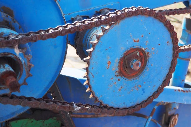 istock Chain drive. Driving roller chain on the drive sprocket in operation 1173409142