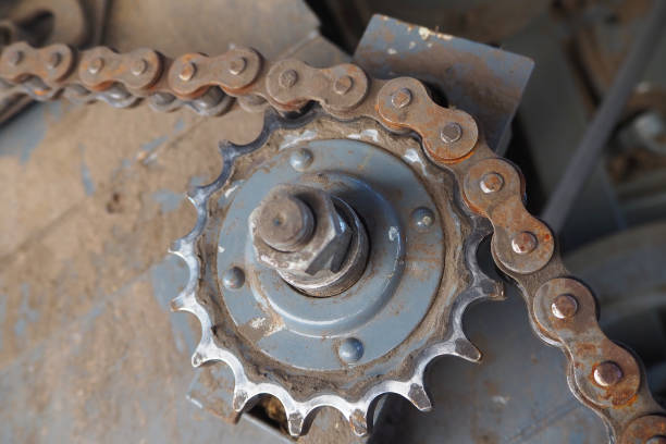 Chain drive. Driving roller chain on the drive sprocket in operation
