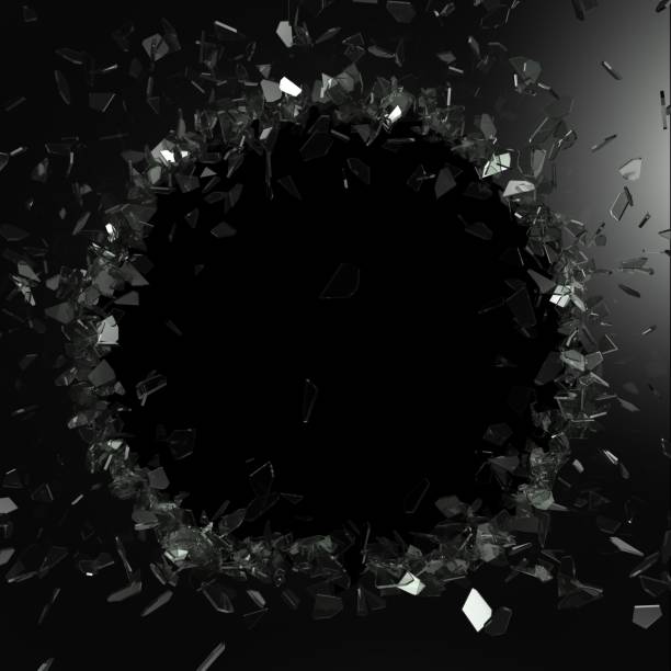 istock Broken glass from the blow, shot on a black isolated background 1173410297