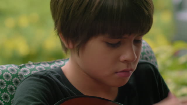 Boy Playing Guitar