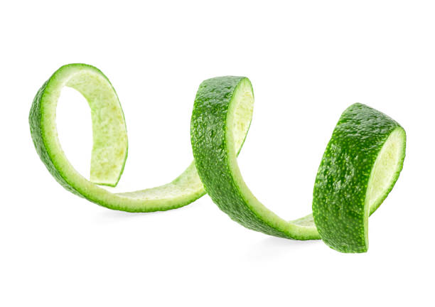 istock Peel of lime isolated on a white background. Lime peel in spiral form. 1173419518
