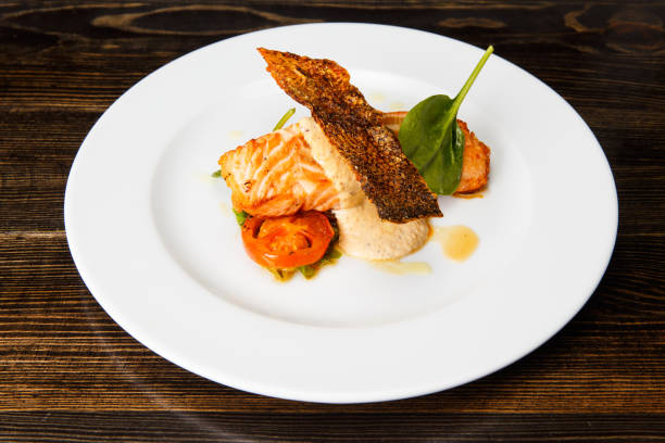 istock Salmon steak with creamy sauce 1173425197