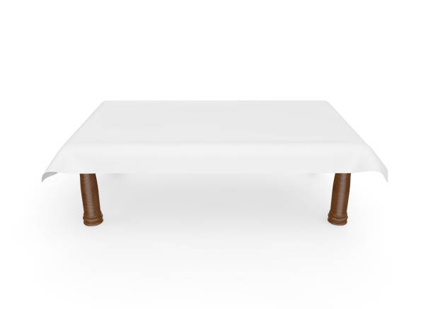 istock A rectangular wooden table with a white tablecloth. There is room for Your design. Isolated white background 1173431373