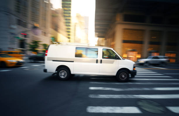 istock White delivery van in Manhattan New York 1173432034