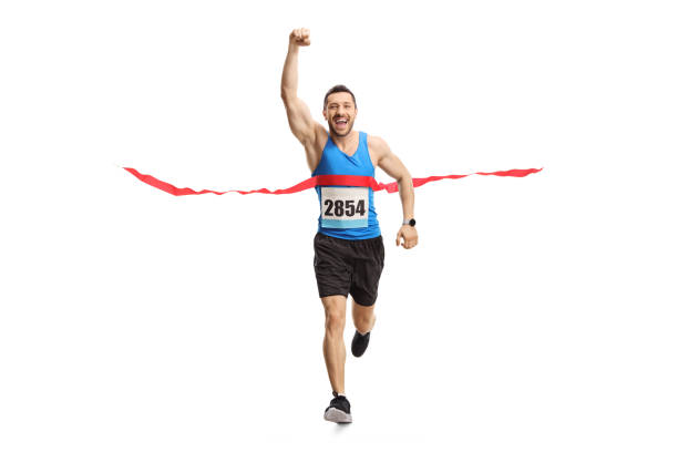 istock Man finishing a marathon and gesturing happiness with hand 1173435051