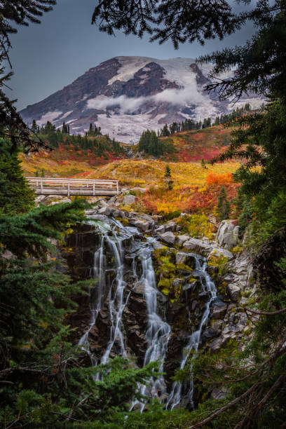 istock Vibrant Fall Colors Surround Myrtyle Falls 1173443752