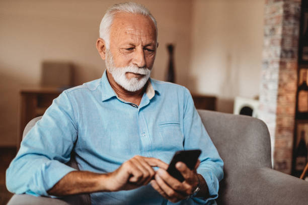 istock Senior man and his smartphone 1173450249
