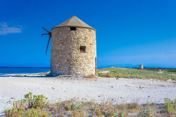 istock Famous Gyra beach with old windmills in Lefkada island, Greece. 1173451685
